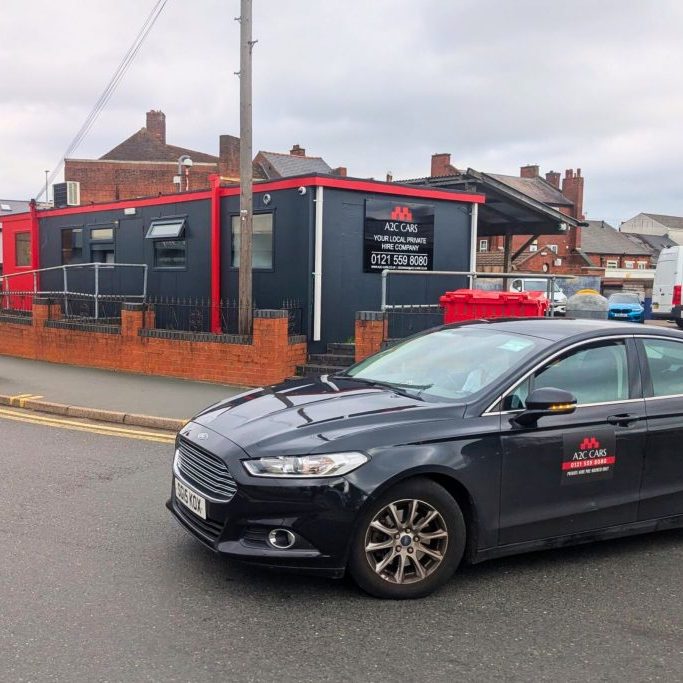 car in front of A2C Cars